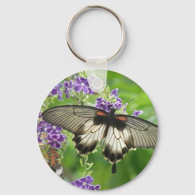 Förklaring till Butterflies Keychain Nyckelring (Framsida)