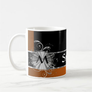 Förkoppra den svart och silvermonogramen kaffemugg