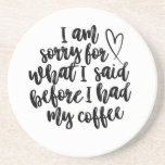 Förlåt för vad jag sa före mitt kaffe underlägg<br><div class="desc">Börja din dag med ett skratt! Det här lekande citatet "Jag beklagar det jag sa innan jag fick kaffe" är perfekt för koffein älskare som inte är riktigt humant förrän första kopp. Perfekt för mugg,  skjortor eller roligtar till dina kaffebesatta vänner.</div>