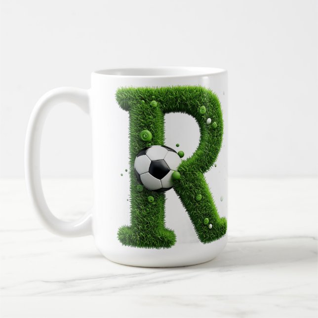 Formad gräsbokstav med fotbollar kaffemugg (Vänster)