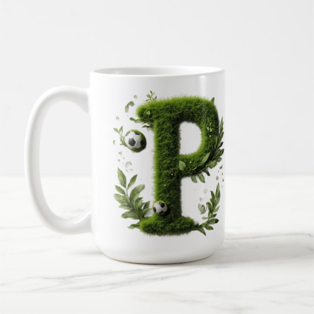 Formad gräsbokstav med fotbollar kaffemugg (Vänster)