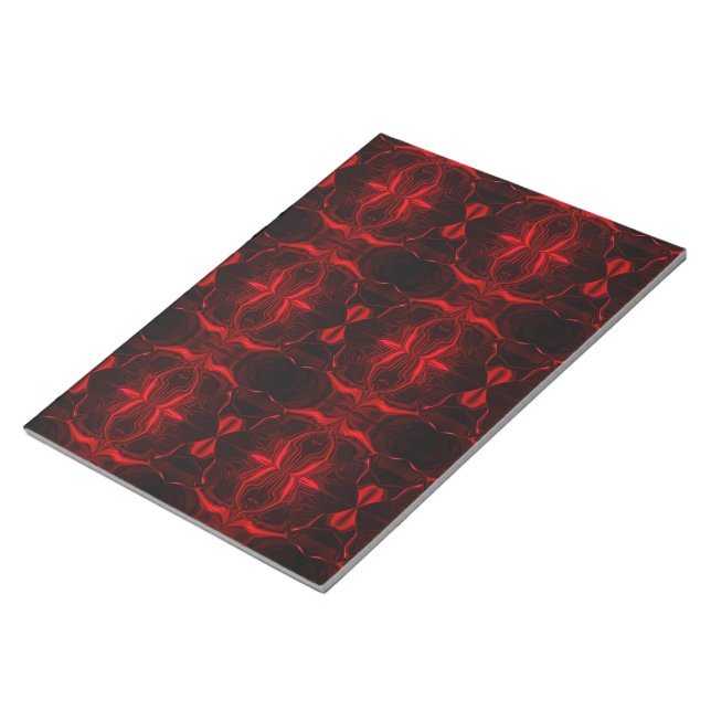 Formas em vermelho 'flutuando' sobre fono preto. anteckningsblock (Vinklad)