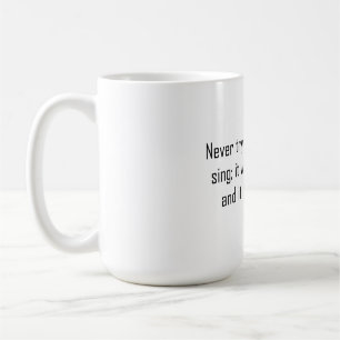 Försök aldrig att lära en gris till sjunga kaffemugg