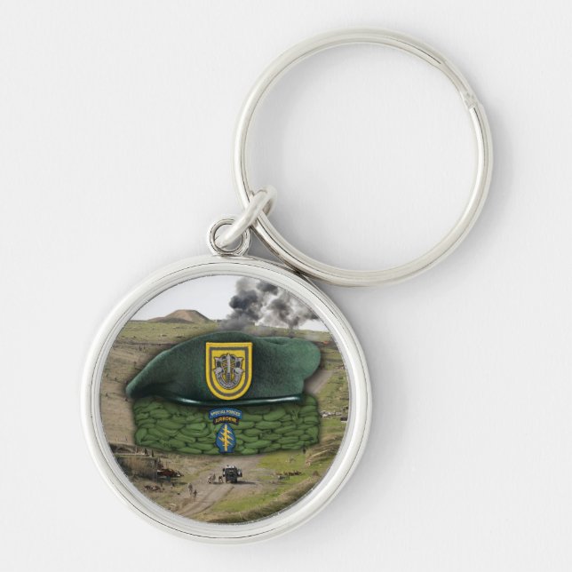 Första grönten för speciella styrkor innehåller ve rund silverfärgad nyckelring (Framsidan)