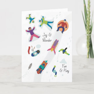 Första snön Vinterbarn som gör snöängel Helgkort