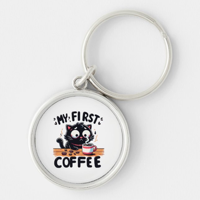 Första Svarta Kaffeäventyret Rund Silverfärgad Nyckelring (Framsidan)