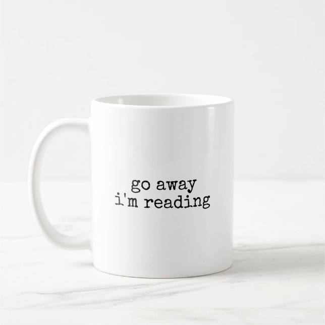 Försvinn, jag läser Rolsk bokälskare Kaffemugg (Vänster)