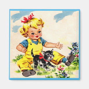 förtjusande liten flicka med den förtjusande lit magnet