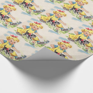 förtjusande liten flicka med den förtjusande lit presentpapper