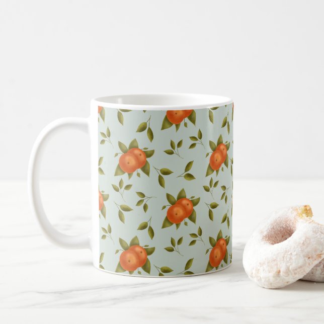 Förtrollande apelmönster på ljus tealbakgrund kaffemugg (Med munk)