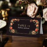 Förtrollat Garden Wedding Escort Card Bordsnummer<br><div class="desc">Den här eleganten, finstilt, Fantasy Enchanted Blommigt Garden-designen är perfekt för ett förtrollat skogstemat firande eller en trädgård party. Den här utformningen har röd och mörk röd blommigt inslag i ram i grönt löv och guld accents mot en svart bakgrund. Matcha objekt i vår butik för ett helt tema i...</div>