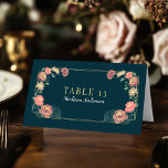 Förtrollat Garden Wedding Escort Card Bordsnummer<br><div class="desc">Den här eleganten, finstilt, Fantasy Enchanted Blommigt Garden-designen är perfekt för ett förtrollat skogstemat firande eller en trädgård party. Den här utformningen har inslag för rosa och lila blommigt i ram i grönt löv och guld accents mot bakgrund av tealbakgrund. Matcha objekt i vår butik för ett helt tema i...</div>