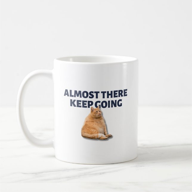 Fortsätt framåt orange katt kaffemugg (Vänster)