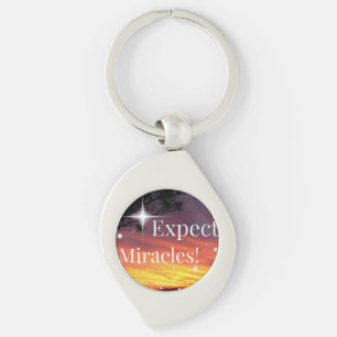 Förvänta spegelvänd Gnistra, solnedvänd inspiratio Swirl Silverfärgad Nyckelring