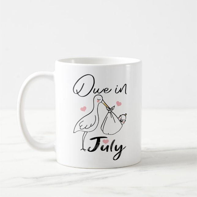 Förväntas i juli Söt svan som bär en rolig ny bebi Kaffemugg (Vänster)