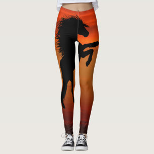 Fostra svart hästar på brännhet solnedgång leggings