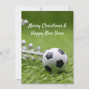Fotboll med jul dekoration på grönt Ho Julkort