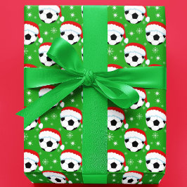 Fotboll som bär Santas hatt & snöflingor Grön Presentpapper