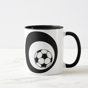 fotboll. svarta cirklar. mugg