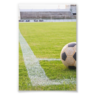 Fotbollboll på fält fodrar fototryck