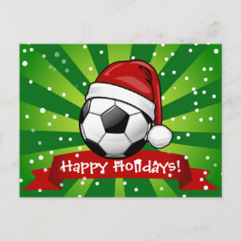 Fotbollboll som ha på sig jul för en Santa hatt Helg Vykort