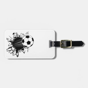 Fotbollboll som ut slår sönder bagagebricka