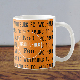 Fotbollsfan eller fotbollsanhängare guld och svart kaffemugg