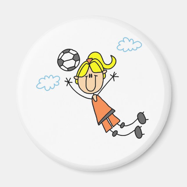 Fotbollsflicka har magnet framför sig (Framsidan)