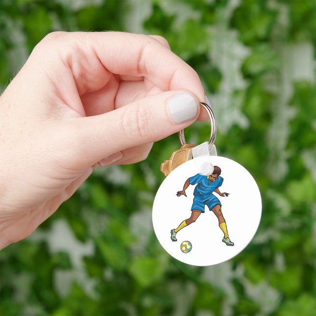 Fotbollsspelare i blått nyckelring (Skapare uppladdad)