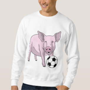 Fotbollsspelare i gris lång ärmad tröja