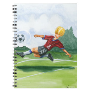 Fotbollsspelare sparkar en boll av Jay Throckmorto Anteckningsbok Med Spiral