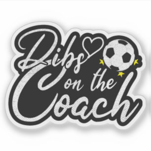 Fotbollstränarens fru hävdar coachen klistermärken