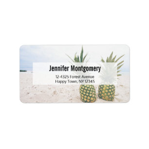 Foto av 2 ananas på en strandadress adressetikett