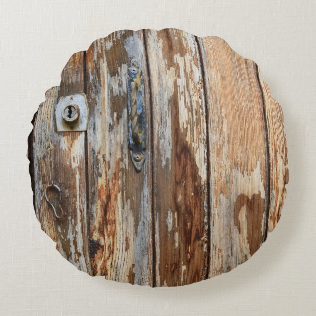 Foto av bruna träskivor rund kudde (Framsidan)