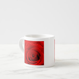 Foto av röd ros bakgrund espressomugg