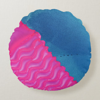 Foto av rosa uppblåsbart leksak rund kudde