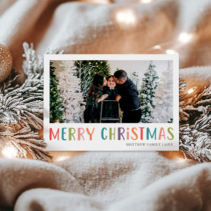 Foto för den ljusa och färgstarka julfamiljen julkort