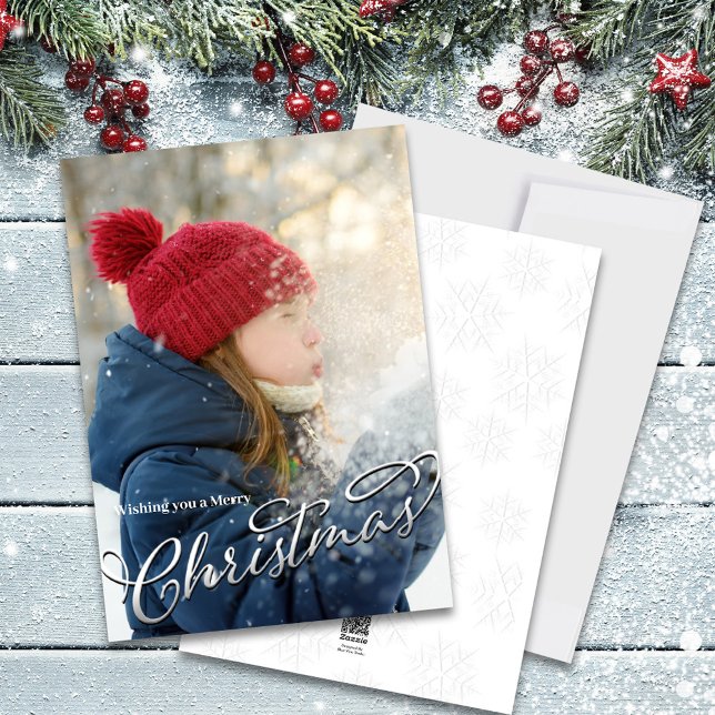 Foto för penselskript God jul Julkort (Merry Christmas silver calligraphy script block lettering. )
