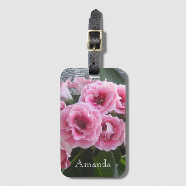 Foto. Lättbukett av rosa blommor. Bagagebricka (Framsida vertikal)
