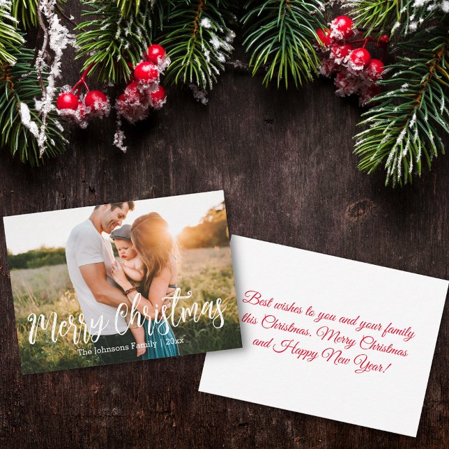 Foto på den vita calligraffamiljen i god jul anteckningskort (Skapare uppladdad)