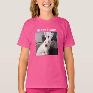 Foto på söt hund som bär påskharens öron rosa t shirt