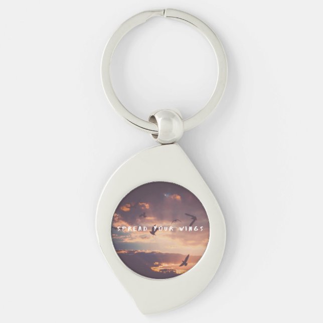 Foto på uppslaget vingar swirl silverfärgad nyckelring (Framsidan)