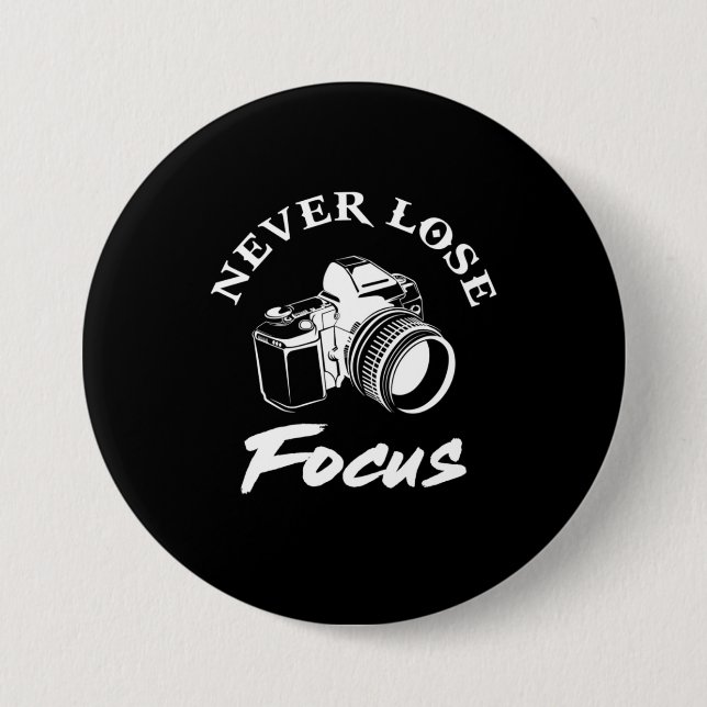 Fotograf förlorar aldrig fokus knapp (Framsida)