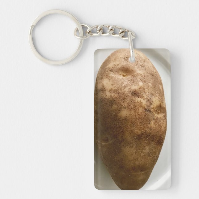 Fotografi av Russetpotatis på vit tallrik (Framsidan)
