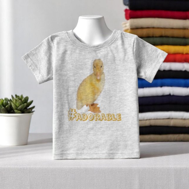 Fotografi över skadliga Gulter Tröja (kids tee shirt front with template text)