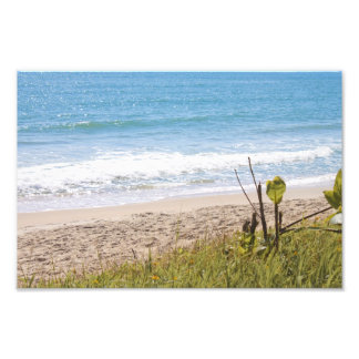 Fotografi över Vinkara strandskärl vid blått hav