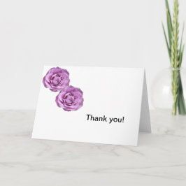 Foton av lavender färgad ro på ett tack kort