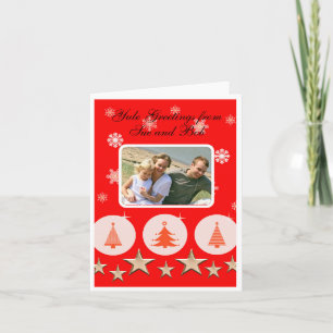 Fotoröd julgranar i familjen kort