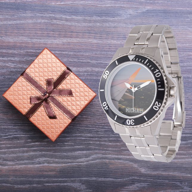 fotot av solljus i vinge, personlig armbandsur (Skapare uppladdad)