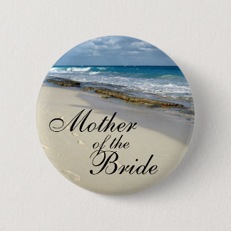 fotspår i sanden knäppas knapp